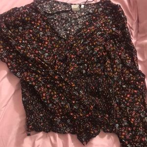 black blouse with red,orange and white flowers